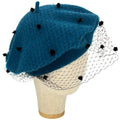 Béret paon avec voile