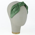 Serre-tête Vivien en satin vert sauge
